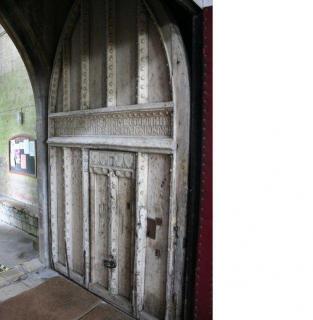 Panel, 1 register, 3 arches across (plaquette; frise d'arcature); reused as door decoration