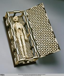 Statuette in an openwork box