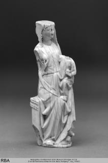 Relief (appliqué) or statuette (Side)